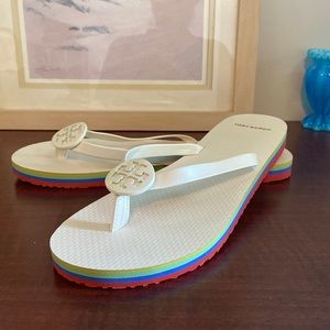 Tory Burch white with emblem flip flops